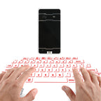 Clavier laser virtuel Bluetooth portable, projecteur sans fil avec fonction souris, compatible avec iPhone, tablette, ordinateur et téléphone.